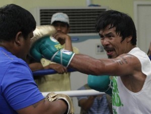 World Boxing Champion and Congressman Pacquiao starts his training at gym in Manila
