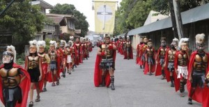 Penitents, locally known as "Morions", wear masks and Roman centurion costumes as they take part in a procession commemorating the passion of Christ during Holy Week at Mogpog town in Marinduque, central Philippines, March 25, 2013. (MNS photo)