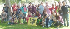 LOOK UP! MOVEMENT AT LA VETERANS PARK: Pastor Fergel Cruz, extreme right, and his family in collaboration with Pastor Benjie Beatima of Temecula, take advantage of California’s beautiful parks as they bring the Gospel to the people through the “Look Up! Movement” launched in July at the Echo Park in LA. The group will attempt to cover 50 parks until 2014 as part of its evangelical mission.