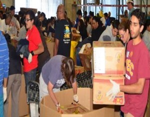 Members of the Alpha Phi Omega Fraternity packed some basic human necessities to be distributed to schools in depressed areas and to other less-privileged areas in and around Los Angeles.