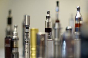 A selection of “Nicotine Containing Products”, or “NCP”s displayed during “The E-Cigarette Summit.” Supporters say the gadget can help wean smokers off conventional tobacco. ©AFP PHOTO / LEON NEAL