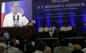 President Benigno S. Aquino III delivers his speech during the Philippine Business for Social Progress (PBSP) Membership Meeting and launch of Mindanao Inclusive Agribusiness Program (MIAP) at the Function Hall 3, SMX Convention Center of the SM Lanang Premier in Lanang, Davao City on Monday (September 08). The event aims to rally PBSP members and other Mindanao companies around the idea of inclusive business, specifically on priority industries: coffee, cacao, corn, palm oil and rubber, as well as possible investments in Bangsamoro. Also in photo are, PBSP executive director Rafael Lopa, Trade and Industry Secretary Gregory Domingo, Mindanao Development Authority chairperson Luwalhati Antonino, PBSP Mindanao Regional Committee chairman Paul Dominguez, Interior and Local Government Secretary Manuel Roxas II and Presidential Adviser on the Peace Process Teresita Quintos-Deles. (MNS photo)
