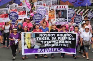 Members of the militant womens group Gabriela marched to Mendiola Tuesday to condemn the Aquino government for having no support to the slain transgender Jennifer Laude. The group acuse the President as "Tuta" of the US Government. Photo by: R.M.