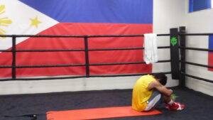 Manny at Rest: Behind the Philippine colors as backdrop in his training room at the Wild Card Boxing Gymn, Manny Pacquiao concludes his day’s hectic training at he prepares for his May 2nd encounter with Floyd Maywearther in Las Vegas.