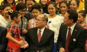 President Benigno S. Aquino III shares the stage with the children at the meeting with the Filipino Community in Rome for a snap shot at the Leptis Magna Function Room of the Ergife Palace Hotel during his official visit here on Thursday (December 03). (MNS photo)