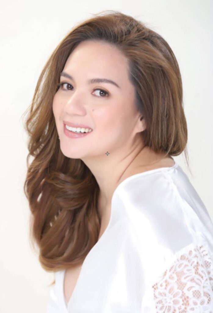 This image has an empty alt attribute; its file name is 12slyvia-698x1024.jpg