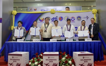 DMW, BOC ink deal to protect OFWs from ‘balikbayan’ box scams, delays